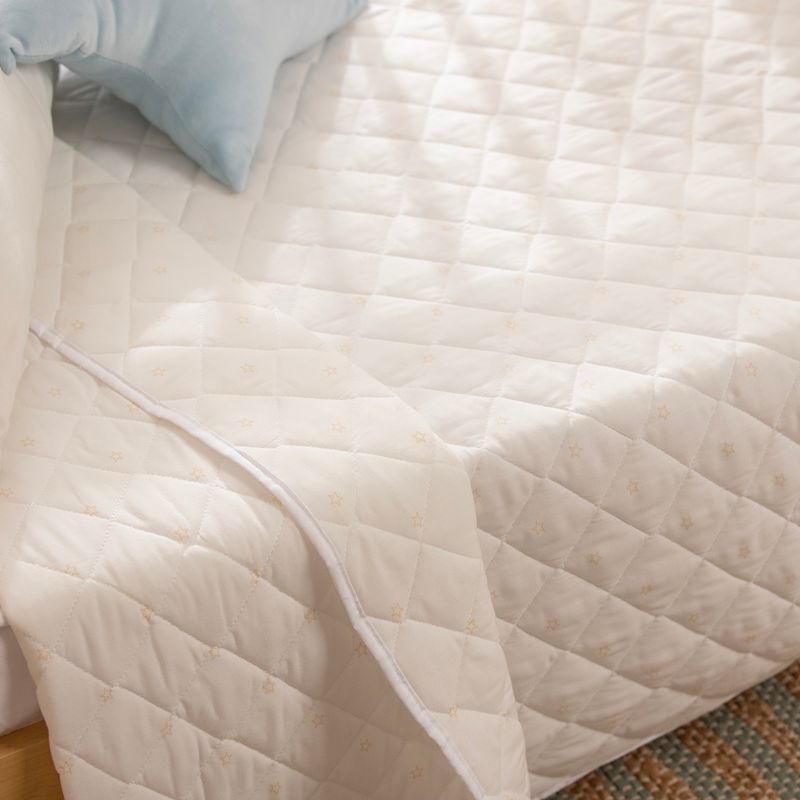Acolchado-Cuna-Funcional-Reversible-de-Algodon-Estrellas-y-Gardenias