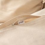 Funda-de-Almohadon-Vuelo-Natural-con-Borlas